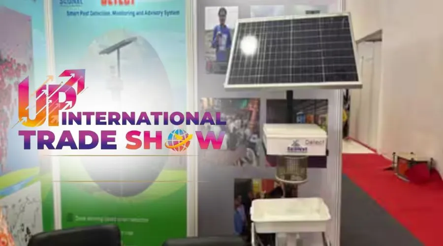 UP International Trade Show booth with solar-powered pest monitoring device.