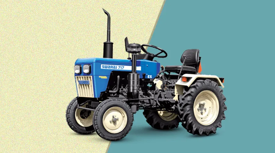 Swaraj 717 mini tractor, featuring a compact design in blue and white