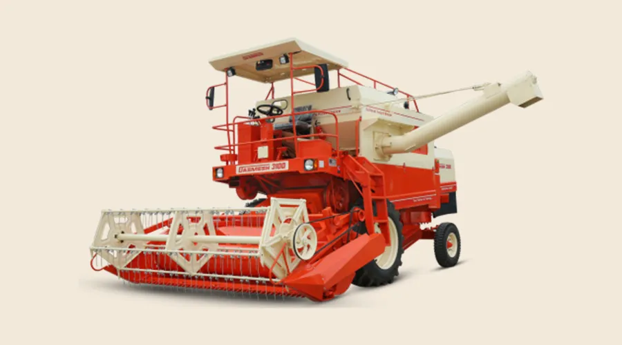 Red and white mini combine harvester for efficient crop harvesting